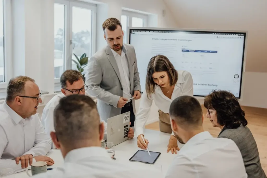 image shown Benefits of Website Redesign team discussion 